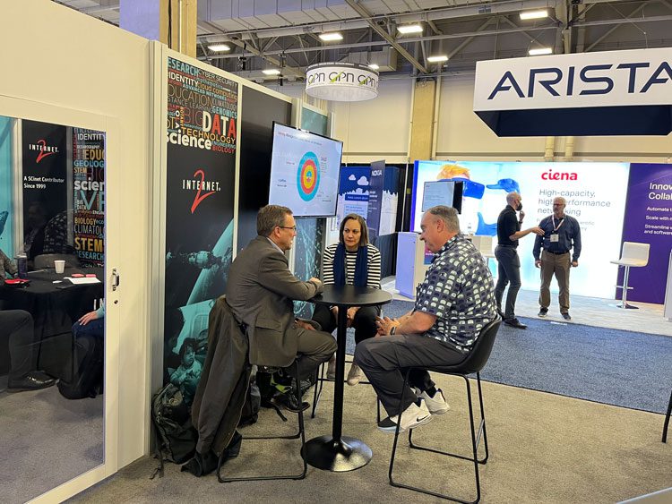 Three professionals conversating during scinet.